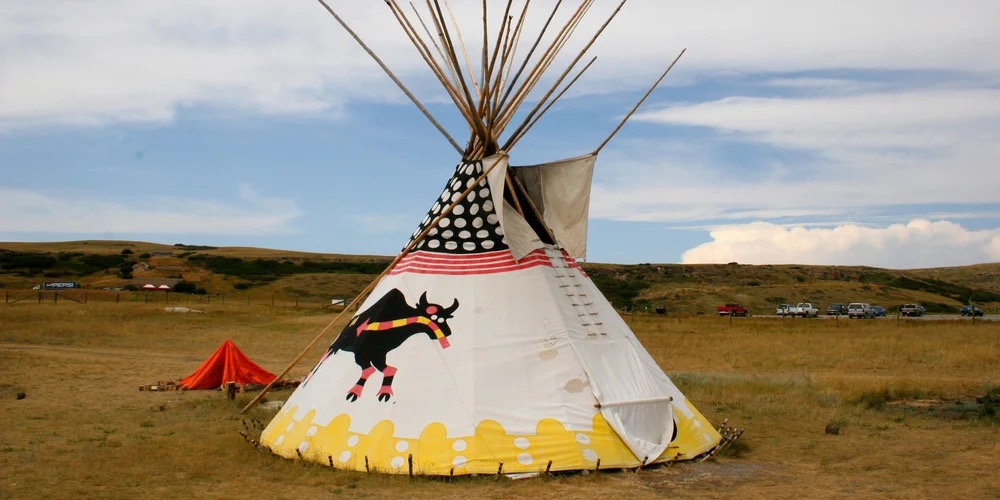 Traditional painted tipi on the plains